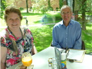 Joan Gem & Lawrence Holden having lunch in the Whitworth Café. Look at the weather!